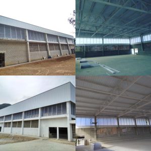 Veneziana de Fibra de Vidro da Solution instalada em fachada industrial, garantindo ventilação natural contínua com alta resistência a intempéries e umidade